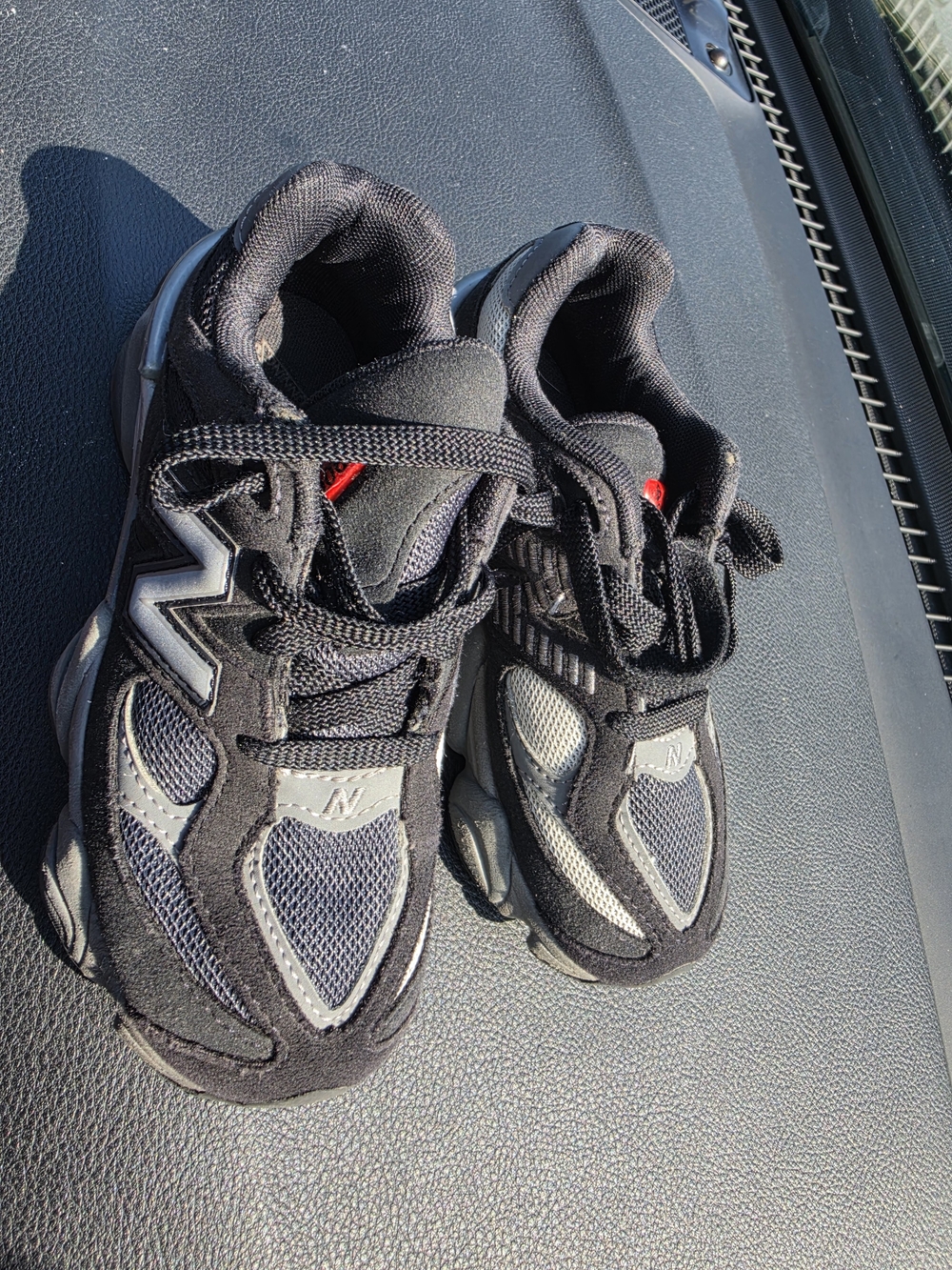 New Balance Black and Gray Kids Sneakers with Red Accent